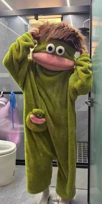 Customer posing in the green Silly Onesie